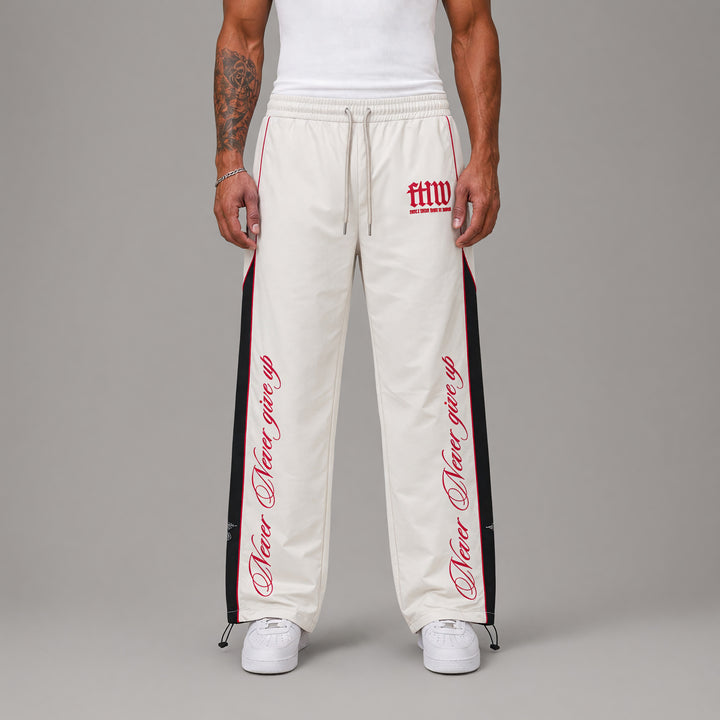 PROPERTY OF FIRST ROW PANTS