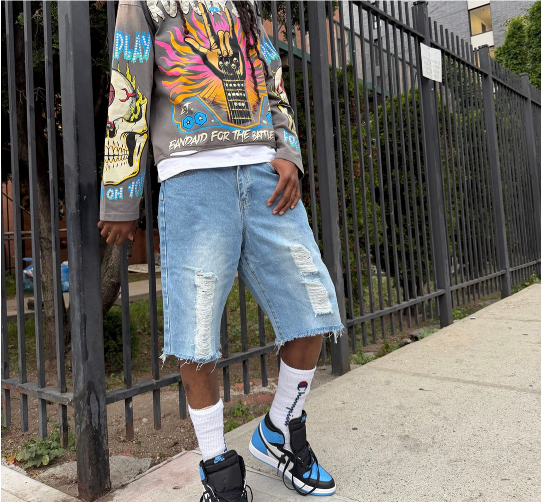 LIGHT BLUE RIPPED BAGGY SHORTS