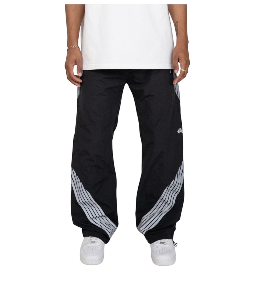 GEAR LOCKER LA black nylon ripstop Drift Pants with 3M reflective tape accents and elastic waistband on a model