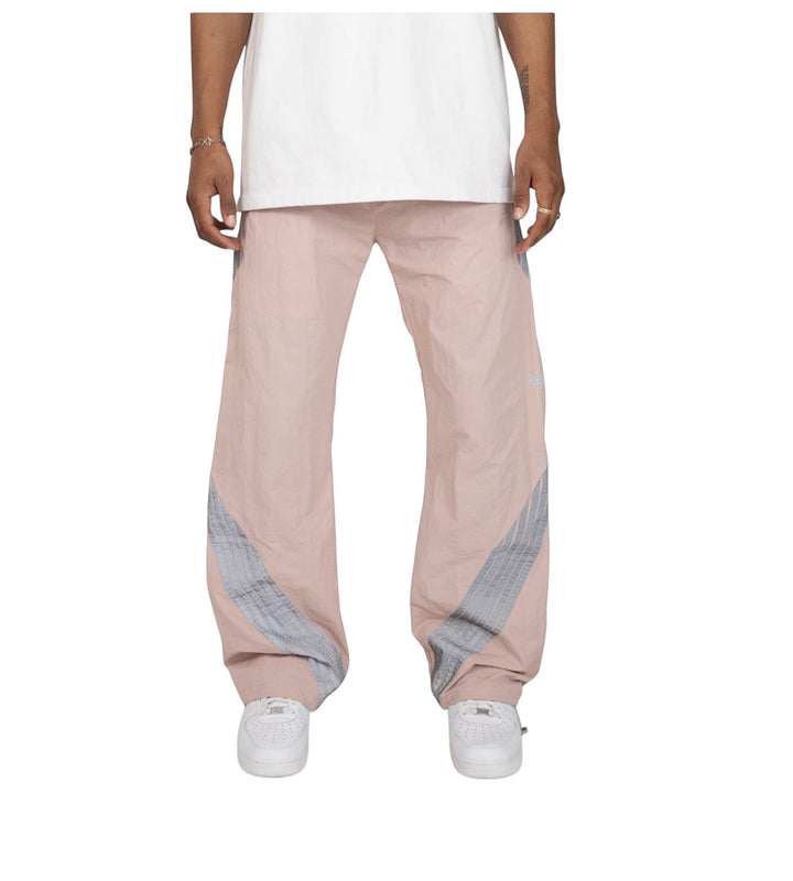 GEAR LOCKER LA Drift pants in dusty pink polyester with 3M reflective side tape and an elastic waistband.